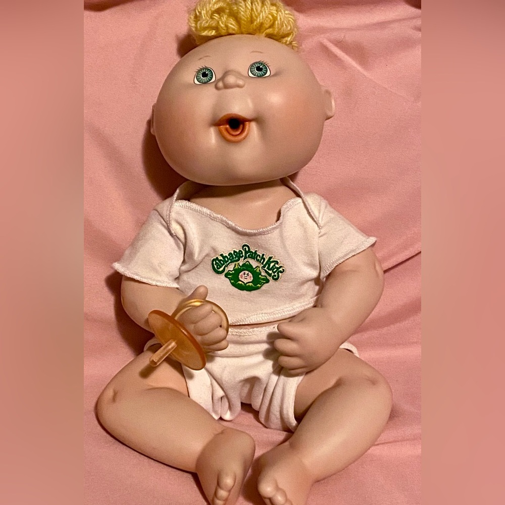 Baby Doll with Orange Pacifier